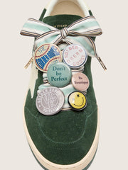 Skins multicolor striped laces with pins