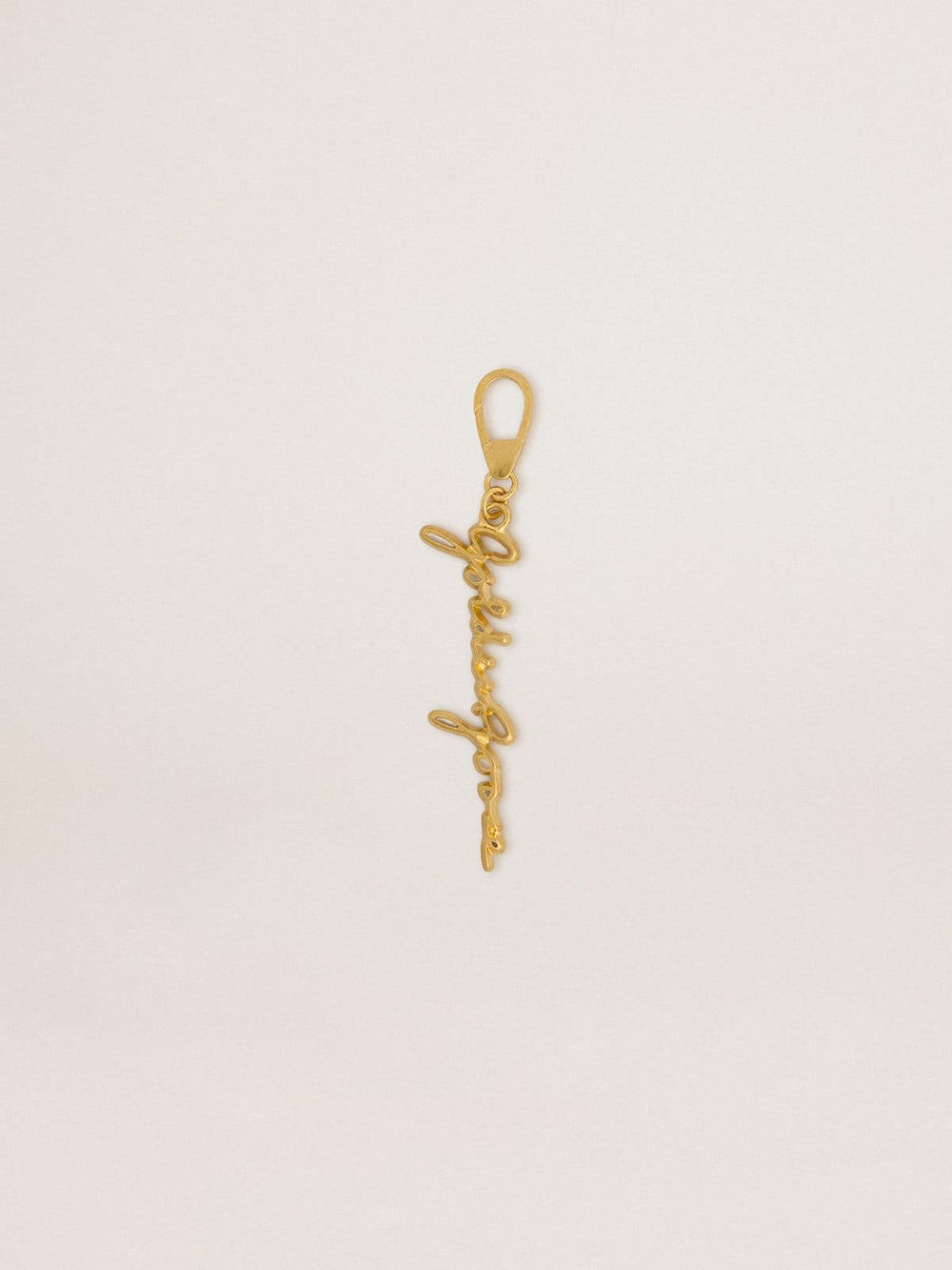 Gold-colored brass charm with Golden Goose signature