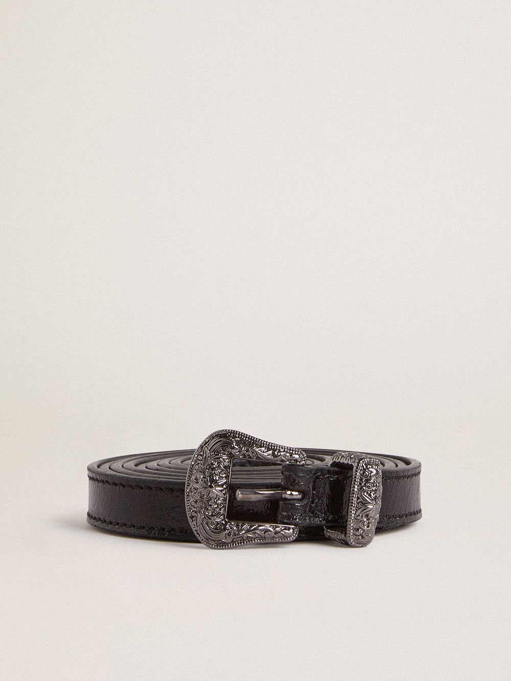 Black leather belt with silver buckle