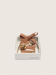 Skins burgundy and peach embroidered laces embellished with charms