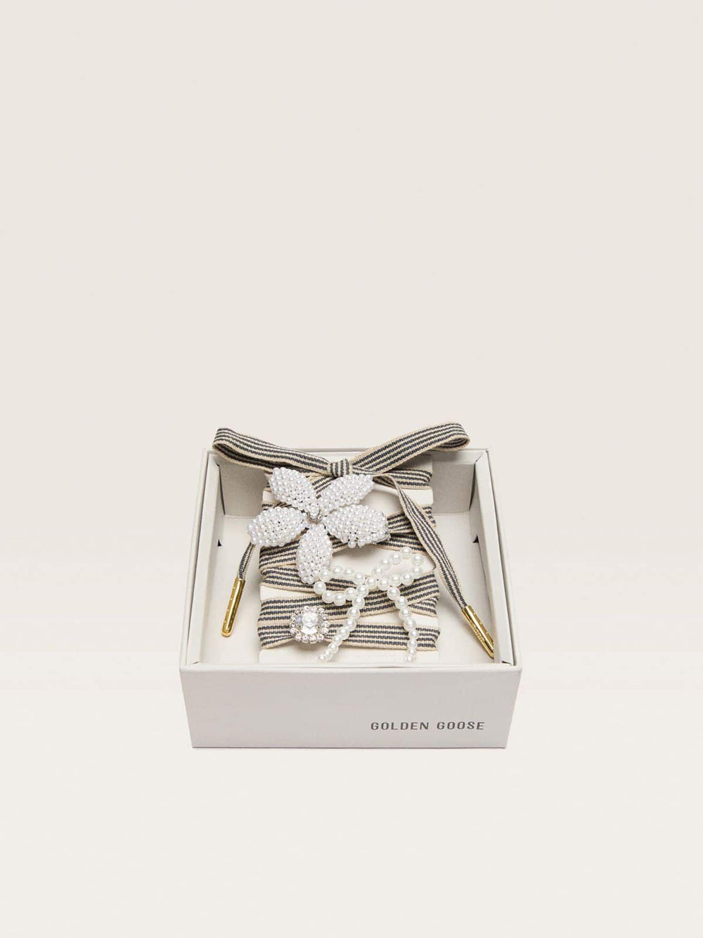 Skins black and beige striped laces with beaded and sparkling charms