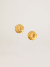 Gold circular earrings