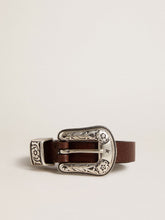 Women's dark brown leather belt with decorated silver buckle