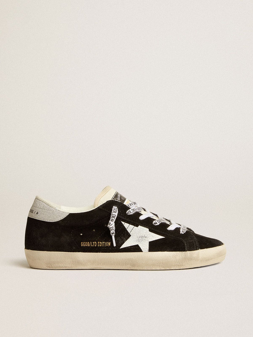 Women's Super-Star LTD in black suede with white printed star and silver glitter heel tab