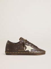 Women’s Super-Star LTD in dark brown leather with cream suede star and studs