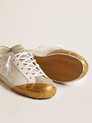 Women's Super-Star LTD in white leather with ice-gray suede inserts and gold-colored tape