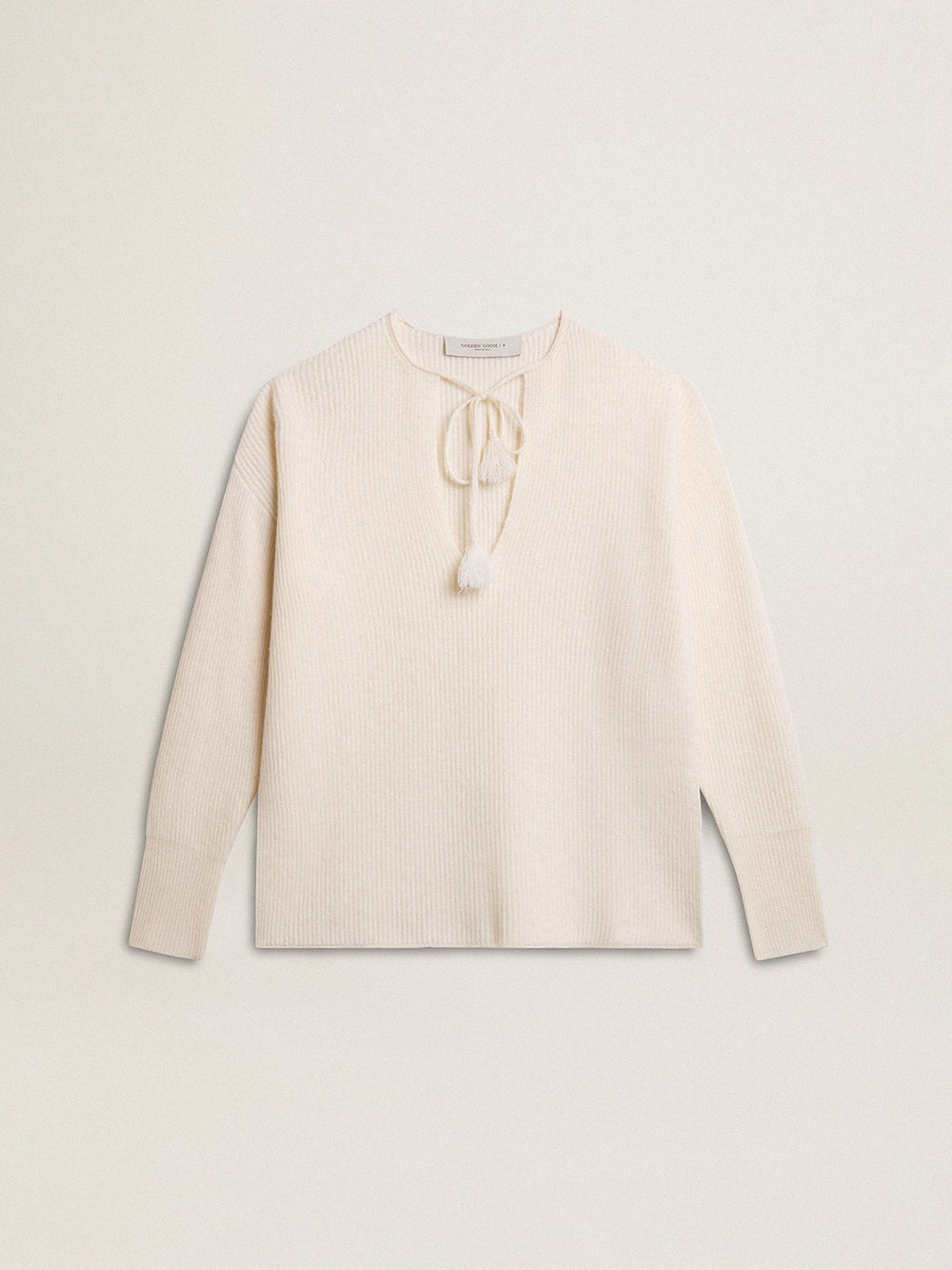 Ribbed wool sweater with V neck and drawstring with tassels