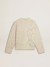 Women’s beige CNY sweater with patterns