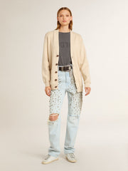 Women’s beige cardigan with 'Golden' lettering on the back