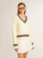 Women's cable-pattern cropped sweater with blue ribbing and crystals