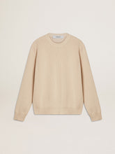 Women's beige sweater with 'Golden' lettering on the back
