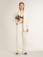 Single-breasted oversize jacket in white with silk effect and embroidery