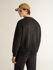 Unisex sweatshirt in worn black cotton with logo embroidery