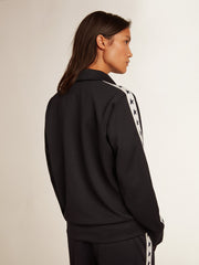 Dark blue zipped sweatshirt with white strip and contrasting stars