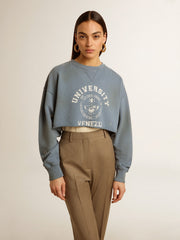 Cropped sweatshirt in baby blue with distressed finish