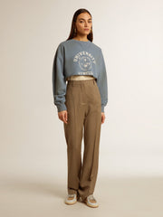 Cropped sweatshirt in baby blue with distressed finish