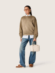 Golden women's boyfriend jeans in stone-washed light blue denim