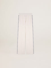 Women’s white joggers with stars on the sides