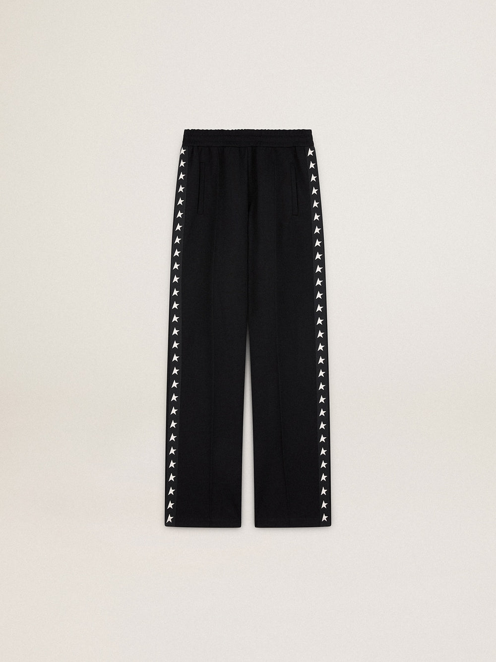 Women’s black joggers with white stars on the sides