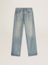 Women's washed jeans with all-over eyelets