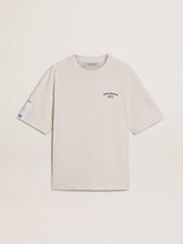 White unisex T-shirt with Mediterranean print and Pescheria Golden patch on the sleeve