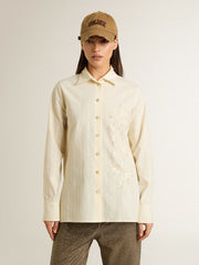 Women's cream-colored cotton shirt with floral embroidery