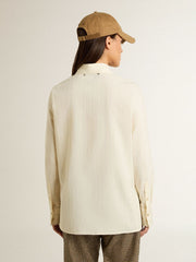 Women's cream-colored cotton shirt with floral embroidery