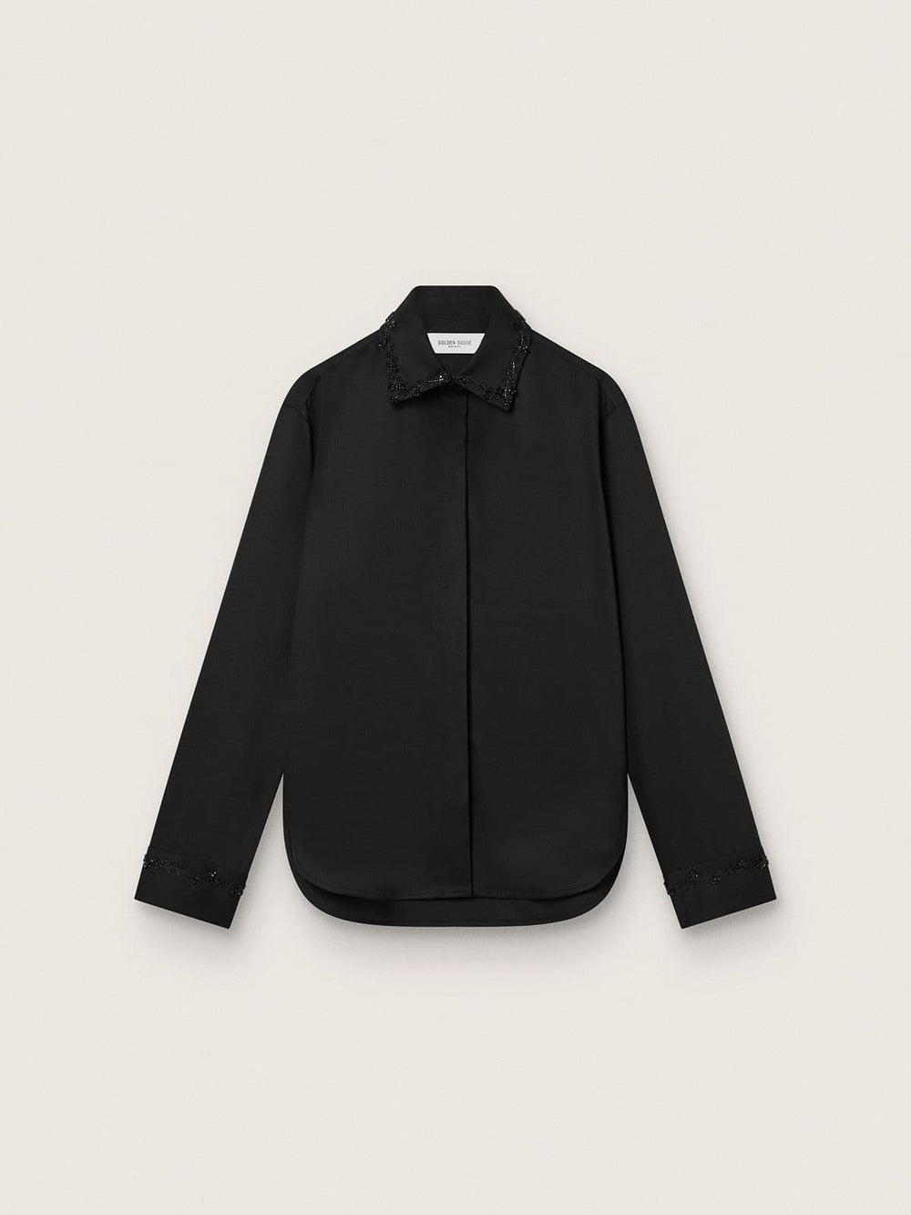 Women's shirt in black wool twill with floral embroidery in glass beads