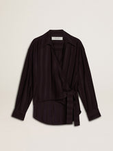 Women's black shirt with vertical stripes and side knot closure