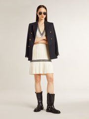 Women's worn-white cotton vest dress with dark blue ribbing and crystals