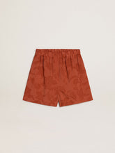 Women's shorts in brick-red jacquard with marine floral pattern