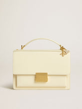 Venezia Bag in butter-colored boarded leather with double charm
