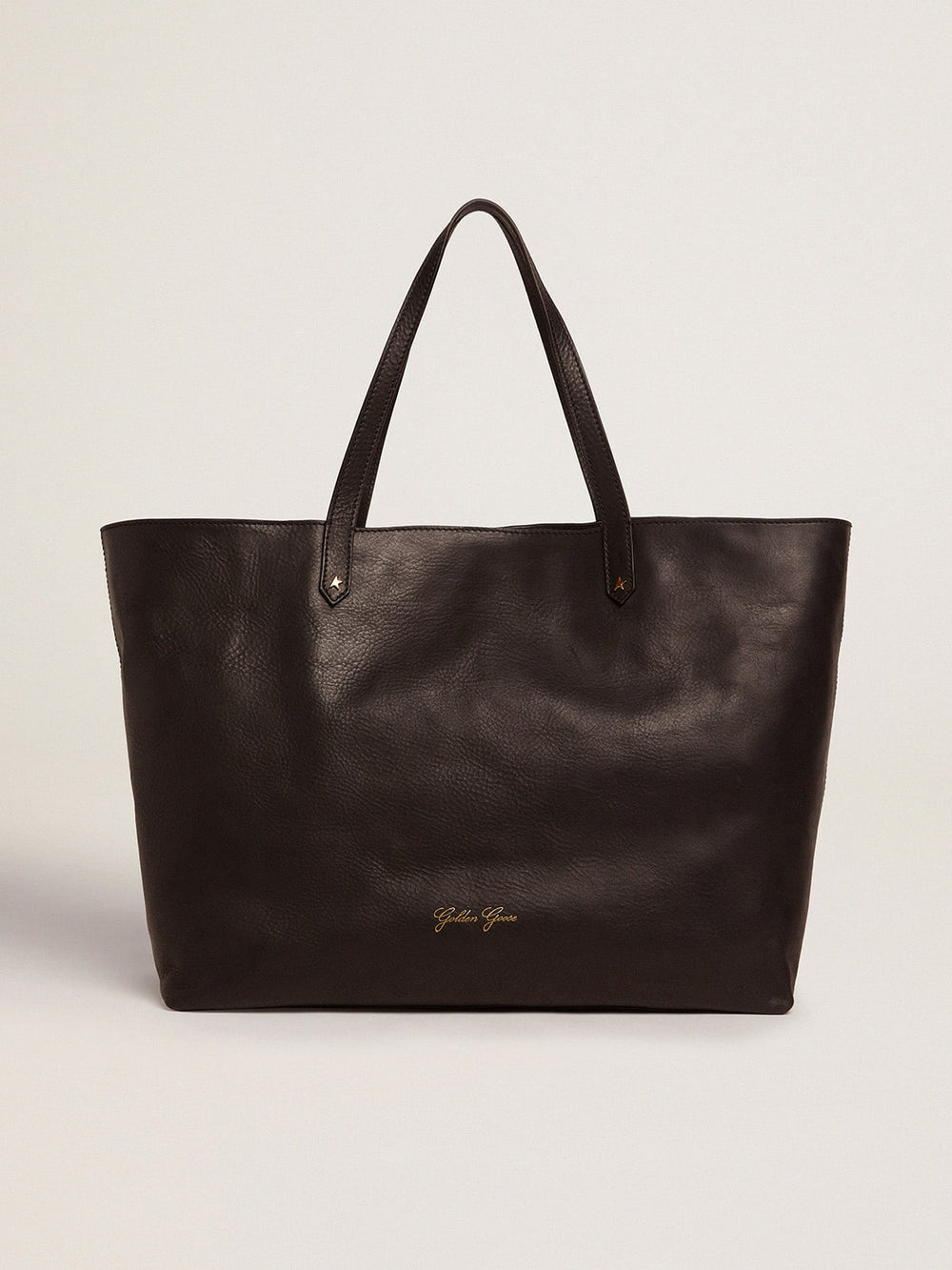 Pasadena Bag in black hammered leather with gold logo on the front
