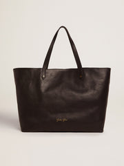 Pasadena Bag in black hammered leather with gold logo on the front