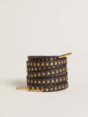 Dark gray Lurex laces with contrasting gold stars