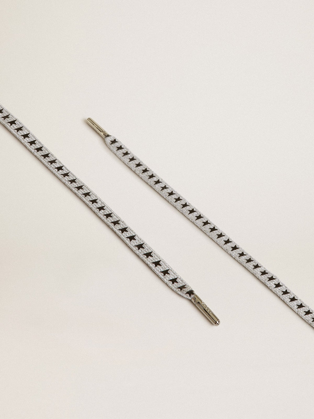 Ice-gray cotton laces with contrasting black stars