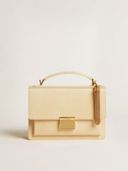 Tassel-shaped charm in antique gold-colored brass