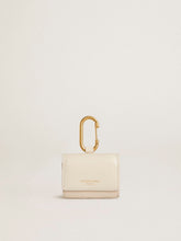 Worn white AirPod case