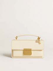 Heart-shaped charm in gold-colored brass with crystals