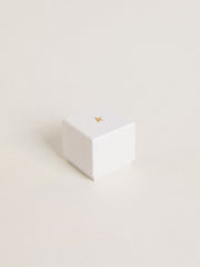 Heart-shaped charm in silver-colored brass with crystals