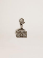 Purse-shaped charm in silver-colored brass with crystals