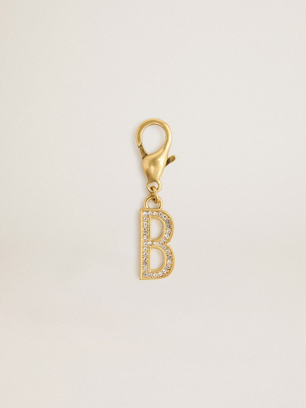 Letter B charm in gold-colored brass with crystals