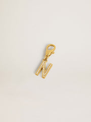 Letter N charm in gold-colored brass with crystals