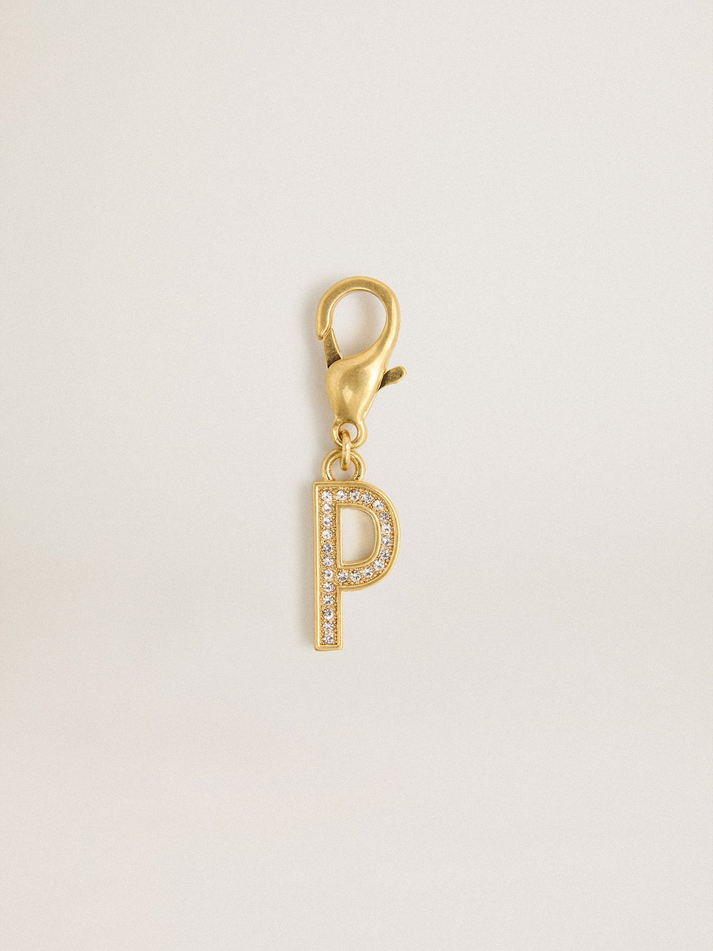 Letter P charm in gold-colored brass with crystals