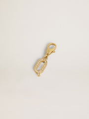 Letter Q charm in gold-colored brass with crystals