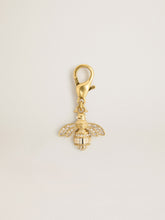 Bee-shaped charm in gold-colored brass with crystals