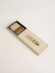 Gray ribbed socks with orange details and red logo