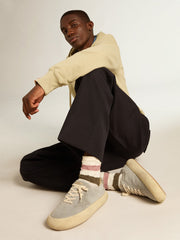 Socks in aged white with multicolor stripes