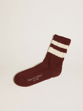 Purple socks with distressed details and worn-white stripes