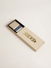 Blue socks with contrasting white stripes and white logo